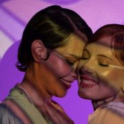 Dos and Donts of Pride Month - women celebrating pride against purple background
