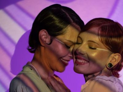 Dos and Donts of Pride Month - women celebrating pride against purple background