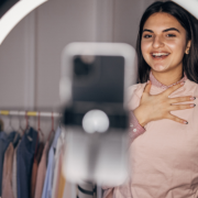 Fashion influencer woman in front of a phone camera and ring light - finding-micro-influencers for your brand